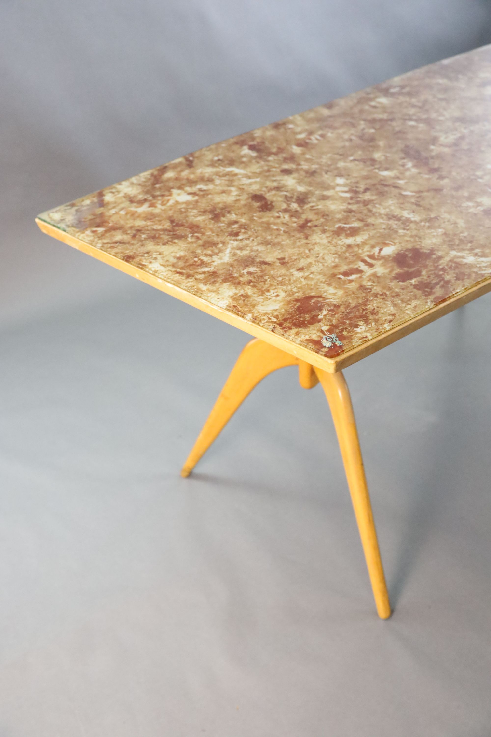 A Carlo Graffi and Franco Compo glass topped beech dining table, W.2ft 7.5in. L.5ft 7.5in. H.2ft 7in.